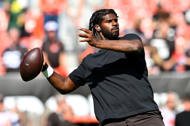 Shedeur Sanders #12 of the Cleveland Browns warms up before the game against the Green Bay Packers at Huntington Bank Field on September 21, 2025 in Cleveland, Ohio.