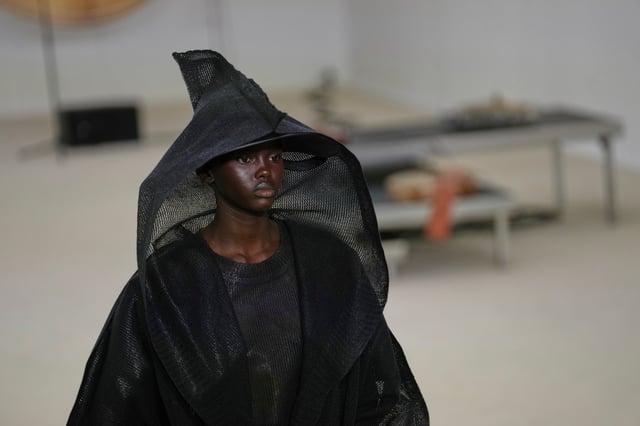 A model wears a creation as part of the Issey Miyake Spring/Summer 2026 collection presented in Paris, Friday, Oct. 3, 2025. (AP Photo/Aurelien Morissard)