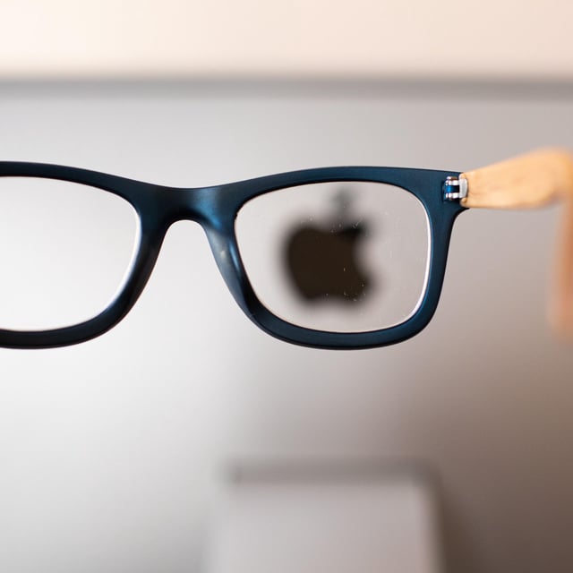 Apple Glass - Apple logo seen through a pair of glasses