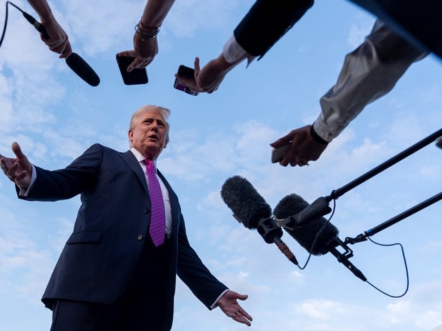 FILE - President Donald Trump speaks with reporters before he departs on Air Force One at Morristown Airport, Sunday, Sept. 14, 2025, in Morristown, N.J. (AP Photo/Alex Brandon, File)
