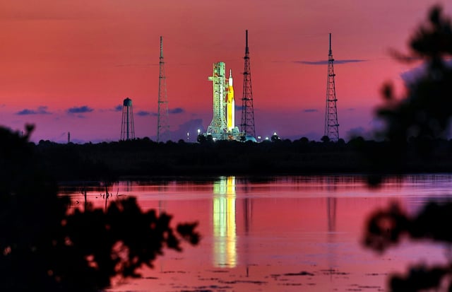 Artemis I sits at Launch Pad 39-B at Kennedy Space Center, Fla., at sunrise, Wednesday, Aug. 31, 2022, as seen from nearby Canaveral National Seashore. (Joe Burbank/Orlando Sentinel/Tribune News Service via Getty Images)