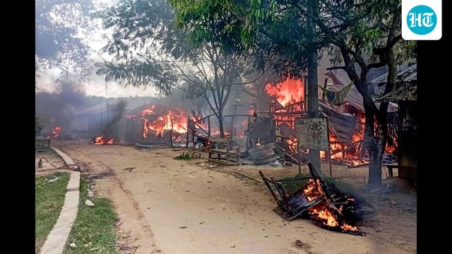 Smoke billows from a burning market area at Guimara in Khagrachari district on September 28, 2025, after it was set ablaze during a clash between Hill and Bengali residents over the alleged rape of a female student, causing authorities to impose Section 144 (AFP FILE)