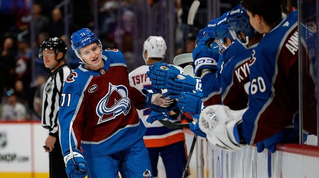 Oct 14, 2024; Denver, Colorado, USA; Colorado Avalanche center Calum Ritchie (71) celebrates with the bench after his goal in the first period against the New York Islanders at Ball Arena. Mandatory Credit: Isaiah J. Downing-Imagn Images