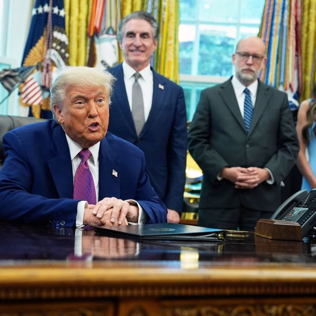 President Donald Trump speaks to the media in the Oval Office at the White House, Tuesday, June 10, 2025, in Washington, as Interior Secretary Doug Burgum, Director of the Office of Management and Budget Russell Vought and Secretary of Homeland Security Kristi Noem, look on. ( (AP Photo/Evan Vucci)