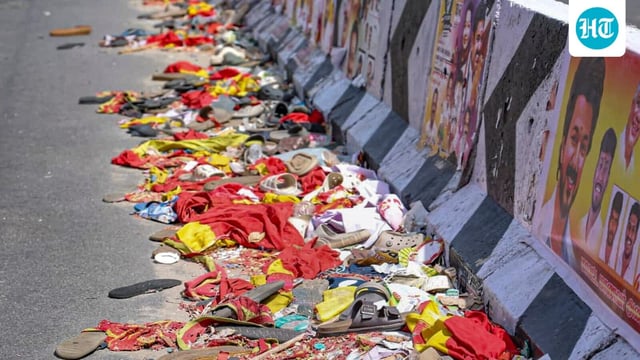 Footwear and other belongings of people lie on a road in the aftermath of stampede during a rally of actor and Tamilaga Vetri Kazhagam (TVK) chief Vijay, in Karur district, Tamil Nadu.