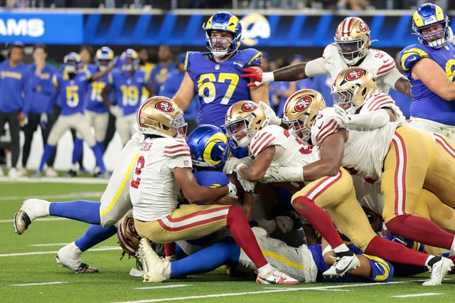 Rams running back Kyren Williams is stopped short on fourth-and-1 during overtime in a 26-23 loss to the San Francisco 49ers on Thursday, Oct. 2, 2025, at SoFi Stadium. (Photo by Ronald Martinez/Getty Images)