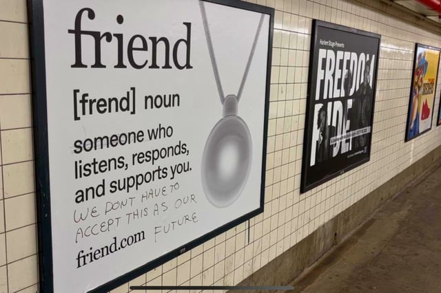 A vandalized ad from AI startup Friend in the New York City subway. Locals have targeted the campaign to denounce what they call “AI surveillance.”