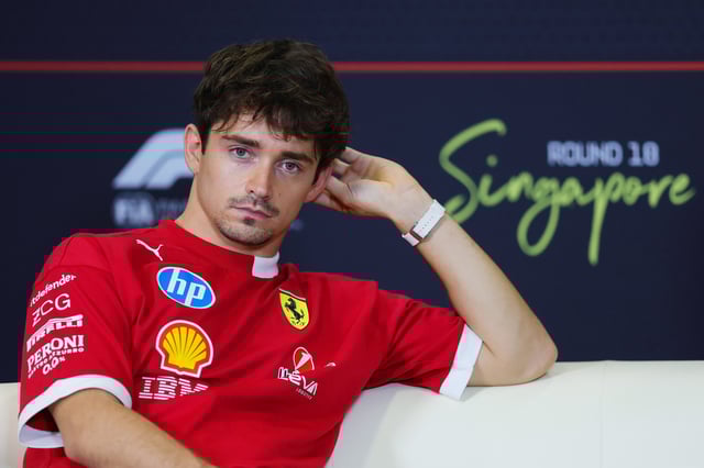 SINGAPORE, SINGAPORE - OCTOBER 02: Charles Leclerc of Monaco and Scuderia Ferrari looks on in the Drivers Press Conference during previews ahead of the F1 Grand Prix of Singapore at Marina Bay Street Circuit on October 02, 2025 in Singapore, Singapore. (Photo by Bryn Lennon/Getty Images)