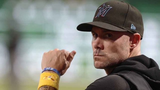 Sep 10, 2024; Pittsburgh, Pennsylvania, USA; Miami Marlins manager Skip Schumaker (45) looks on from the dugout against the Pittsburgh Pirates during the fifth inning at PNC Park. Mandatory Credit: Charles LeClaire-Imagn Images