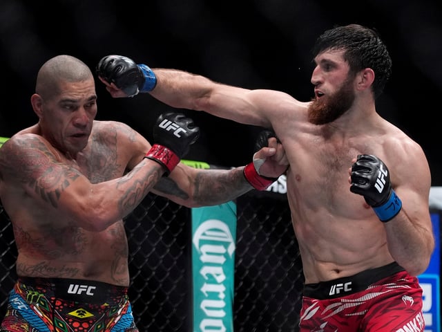 FILE - Alex Pereira, left, fights Magomed Ankalaev during a UFC 313 mixed martial arts light heavyweight title bout Saturday, March 8, 2025, in Las Vegas. (AP Photo/John Locher, File)