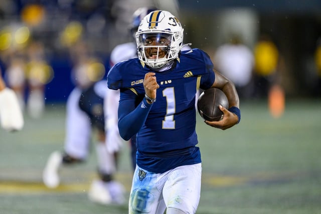 Quarterback Keyone Jenkins led FIU to a win over UConn two seasons ago as a freshman. He's back to lead the Golden Panthers into Saturday's matchup at Rentschler Field. (AP Photo/Doug Murray)