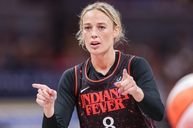 Sophie Cunningham #8 of the Indiana Fever motions to a teammate during the game against the Chicago Sky at Gainbridge Fieldhouse on August 9, 2025 in Indianapolis, Indiana.