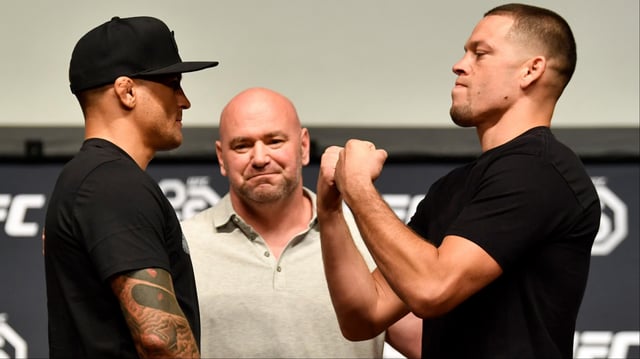 Dustin Poirier and Nate Diaz face off at a UFC press conference. Credit: Jeff Bottari/Zuffa LLC