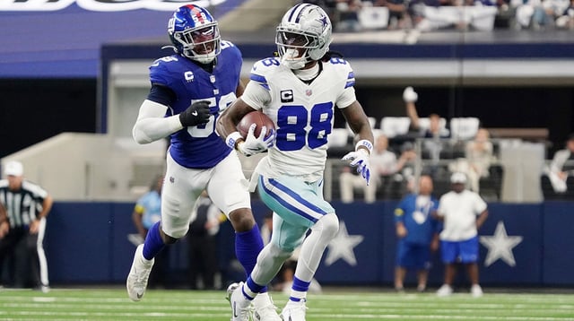 Sep 14, 2025; Arlington, Texas, USA; Dallas Cowboys wide receiver CeeDee Lamb (88) runs with the ball against the New York Giants during the second quarter at AT&T Stadium. Mandatory Credit: Raymond Carlin III-Imagn Images