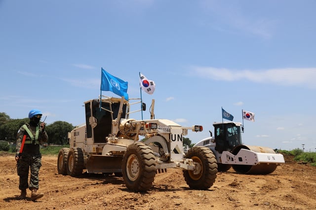 Soldiers deployed to the Hanbit unit in South Sudan take part in an airport runway construction project in this photo provided by South Korea's Joint Chiefs of Staff on Oct. 4, 2025. (PHOTO NOT FOR SALE) (Yonhap)