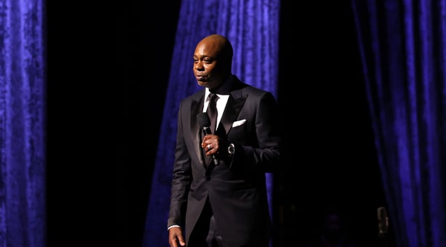 Dave Chappelle speaks onstage during the Jazz at Lincoln Center Gala on April 30, 2025 in New York City. (Michael Loccisano/Getty Images for Jazz At Lincoln Center)