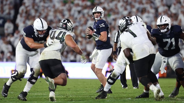 Sep 27, 2025; University Park, Pennsylvania, USA; Penn State Nittany Lions quarterback Drew Allar (15) looks downfield prior to throwing during the fourth quarter against the Oregon Ducks at Beaver Stadium. Mandatory Credit: Matthew O'Haren-Imagn Images