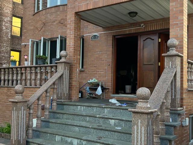 The scene where a 27-year-old man stabbed his 50-year-old mother to death before turning the knife on a 17-year-old and himself inside 45-18 Smart St in Flushing, Queens on October 2, 2025. (Kerry Burke/NYDN)