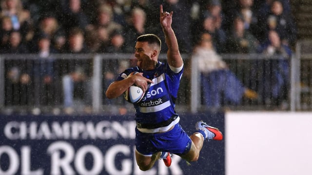 Redpath, the Scotland centre, celebrates scoring Bath’s second try