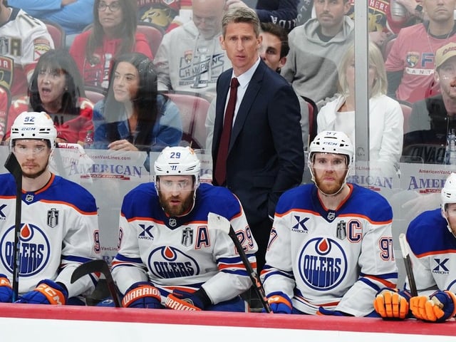  Edmonton Oilers head coach Kris Knoblauch watches the play from the bench with Vasily Podkolzin, left to right, Leon Draisaitl, Connor McDavid and Corey Perry during the second period in Game 6 of the Stanley Cup Final against the Florida Panthers in Sunrise, Fla., on Tuesday, June 17, 2025.