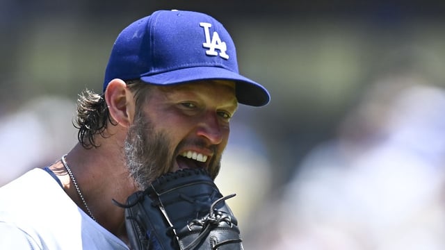 Jul 20, 2025; Los Angeles, California, USA; Los Angeles Dodgers starting pitcher Clayton Kershaw (22) reacts after being relieved from the game against the Milwaukee Brewers during the fifth inning at Dodger Stadium. Mandatory Credit: Jonathan Hui-Imagn Images