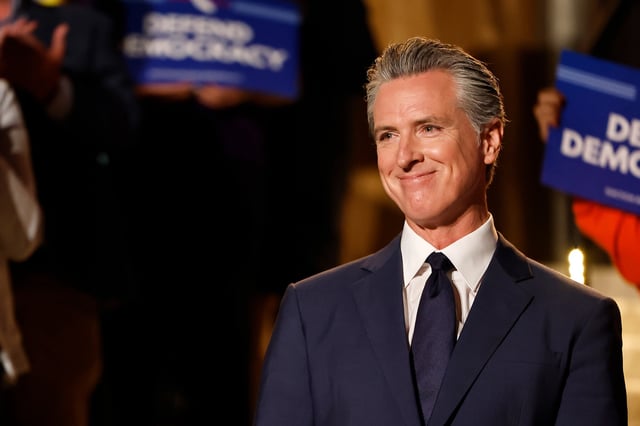 California Gov. Gavin Newsom waits to speak about the Election Rigging Response Act at a press conference at the Democracy Center, Japanese American National Museum, on Aug. 14, 2025 in Los Angeles.
