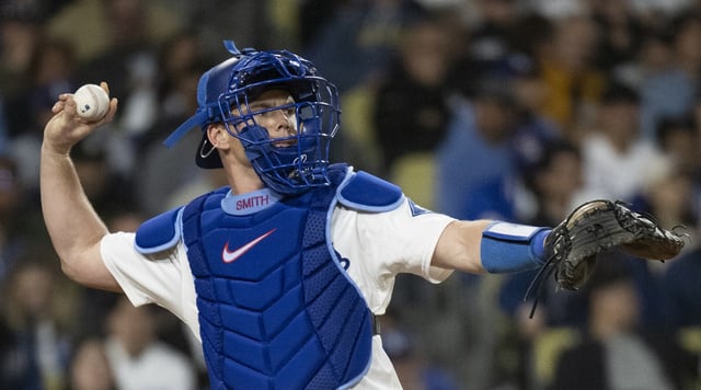 Dodgers catcher Will Smith, who has not played since Sept. 9 while a hairline fracture in his right hand has been healing, is expected to be available to catch during the National League Division Series against the Philadelphia Phillies. (AP Photo/Kyusung Gong)
