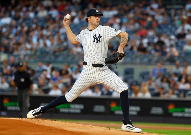 New York Yankees' Cam Schlittler throws against the Washington Nationals during the first inning of a baseball game, Monday, Aug. 25, 2025, in New York. (AP Photo/Noah K. Murray)