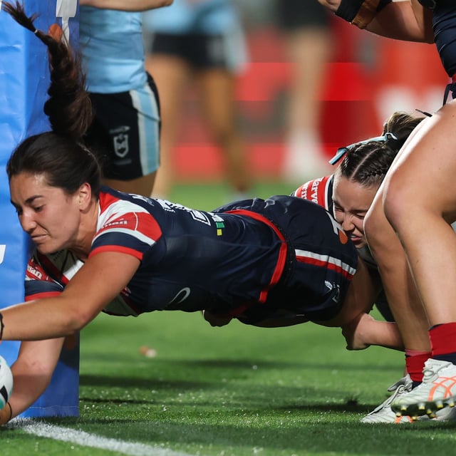 Olivia Kernick of the Roosters scores a try during the NRLW preliminary final match between Sydney Roosters and Cronulla Sharks at Polytec Stadium, on September 27, 2025, in Gosford, Australia. 