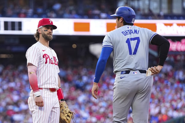 PHILADELPHIA, PENNSYLVANIA – JULY 9: Bryce Harper #3 of the Philadelphia Phillies looks on against Shohei Ohtani #17 of the Los Angeles Dodgers in the top of the third inning at Citizens Bank Park on July 9, 2024 in Philadelphia, Pennsylvania. The Phillies defeated the Dodgers 10-1. (Photo by Mitchell Leff/Getty Images)