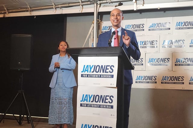 Jay Jones addresses supporters after winning the Democratic nomination for Virginia Attorney General as wife Mavis Jones looks on in Norfolk, Va., on June 17, 2025.