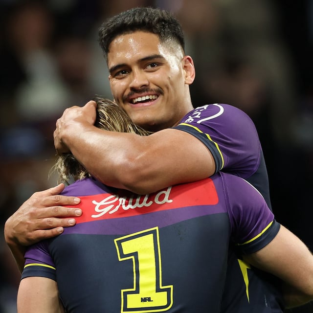 Shawn Blore and Ryan Papenhuyzen of the Storm celebrate winning the NRL Preliminary Final match between the Melbourne Storm and Cronulla Sharks at AAMI Park on September 26, 2025, in Melbourne, Australia. 
