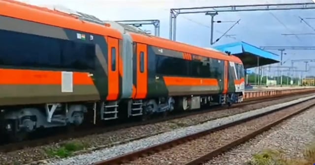 A  Vande Bharat train entering an unspecified railway station