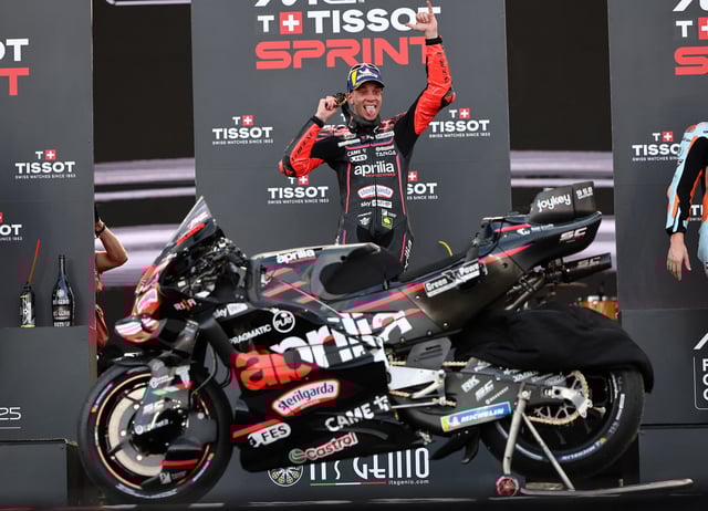 MotoGP -  Indonesian Grand Prix - Mandalika International Street Circuit, Mandalika, Indonesia - October 4, 2025 Aprilia Racing's Marco Bezzecchi celebrates after winning the sprint race REUTERS/Willy Kurniawan