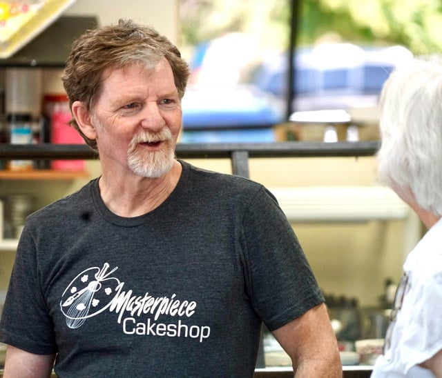 Masterpiece Cakeshop owner Jack Phillips talks with a customer following a Supreme Court ruling on June 4, 2018 in Lakewood, Colo. A divided Supreme Court absolved the Colorado baker of discrimination for refusing to create a custom wedding cake for a same-sex couple, ruling that the state exhibited "religious hostility" against him.

Usp News Supreme Court Cake Shop Decision A Usa Co
