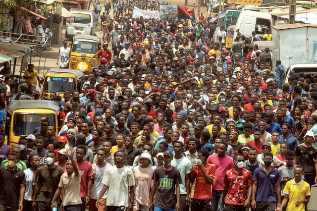 Crowds of young anti-government protesters call for a general strike and for President Andry Rajoelina to resign during a demonstration in Antsiranana, Madagascar on October 2.