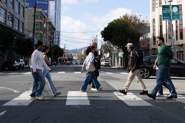 Pedestrians cross Bryant Street near a speed camera location in San Francisco on Friday, Oct. 3, 2025.