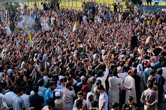 Members of the Awami Action Committee, a civil rights alliance, chant slogans during a rally demanding subsidized food, electricity and other services in Muzaffarabad, the capital of Pakistani controlled Kashmir, Tuesday, Sept. 30, 2025. (AP Photo/M.D. Mughal)