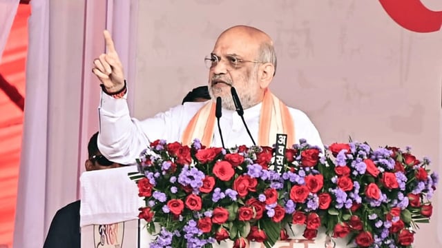 Jagdalpur, Oct 04 (ANI): Union Home Minister Amit Shah speaks during the "Bastar Dussehra Lokotsav" program, in Jagdalpur on Saturday. (@vishnudsai X/ANI Photo)