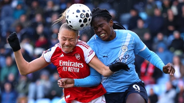 Frida Maanum, centre left, and Shaw compete for the ball