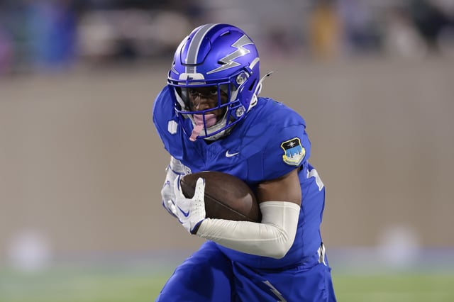 Tylor Latham #25 of the Air Force Falcons runs with the ball during the fourth quarter against the Colorado State Rams at Falcon Stadium on October 19, 2024 in Colorado Springs, Colorado.