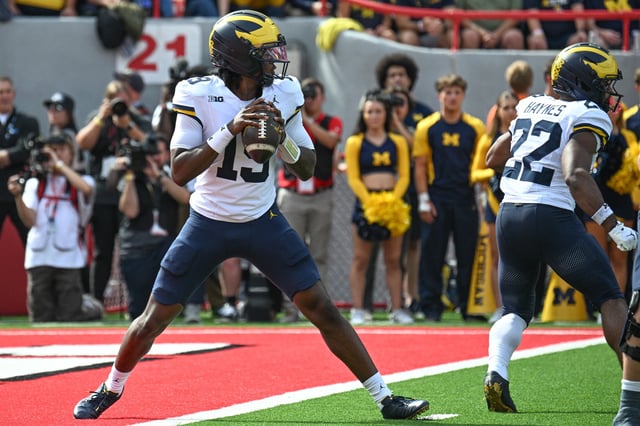 Bryce Underwood #19 of the Michigan Wolverines looks to pass against the Nebraska Cornhuskers at Memorial Stadium on September 20, 2025 in Lincoln, Nebraska.