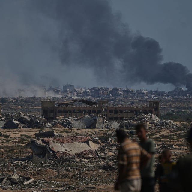 Smoke rises to the sky following an Israeli military strike in Gaza City, as seen from the central Gaza Strip, Thursday, Oct. 2, 2025. (AP Photo/Abdel Kareem Hana)