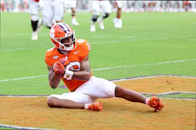 Bryant Wesco Jr. #12 of the Clemson Tigers scores a touchdown against the Syracuse Orange during the fourth quarter at Memorial Stadium on September 20, 2025 in Clemson, South Carolina.