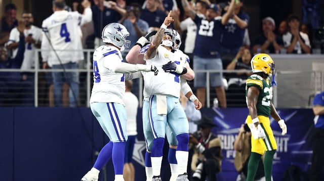 Sep 28, 2025; Arlington, Texas, USA; Dallas Cowboys quarterback Dak Prescott (4) celebrates in the third quarter against the Green Bay Packers at AT&T Stadium. Mandatory Credit: Kevin Jairaj-Imagn Images