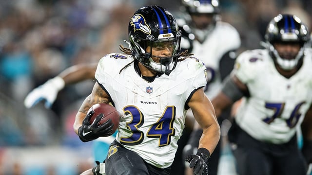 Dec 17, 2023; Jacksonville, Florida, USA; Baltimore Ravens running back Keaton Mitchell (34) runs the ball against the Jacksonville Jaguars in the fourth quarter at EverBank Stadium.