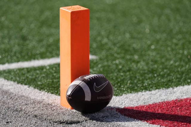 Generic view of a Nike Vapor Elite Game Football up against a pylon before the game between the Ohio State Buckeyes and the Purdue Boilermakers at Ohio Stadium on November 09, 2024 in Columbus, Ohio.