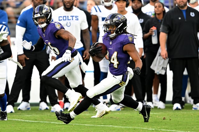 BALTIMORE, MARYLAND - AUGUST 07: Keaton Mitchell #34 of the Baltimore Ravens rushes the ball against the Indianapolis Colts during the NFL Preseason 2025 game at M&T Bank Stadium on August 07, 2025 in Baltimore, Maryland. (Photo by G Fiume/Getty Images)