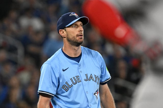 Sep 24, 2025; Toronto, Ontario, CAN;  Toronto Blue Jays pitcher Max Scherzer (31) watches the ball being retrieved after giving up a single to Boston Red Sox right fielder Wilyer Abreu (52) in the fourth inning at Rogers Centre. Mandatory Credit: Dan Hamilton-Imagn Images