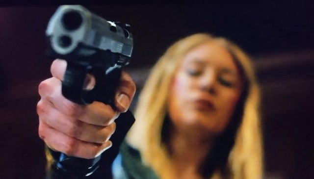 PEACEMAKER Star Jennifer Holland On Harcourt's Decision To Kill [SPOILER] & "Throwing Mein Kampf At A Nazi"